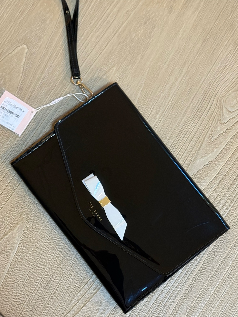 Ted Baker Black Patent Clutch with White Bow Accent